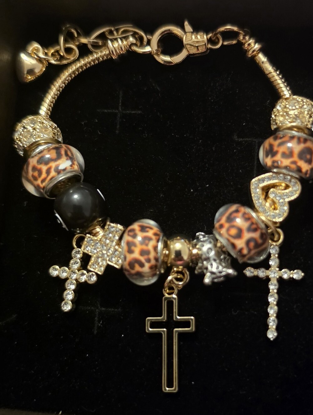 Gold-Tone Charm Bracelet with Leopard Beads and Cross Pendants